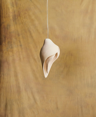 Womb Pendants