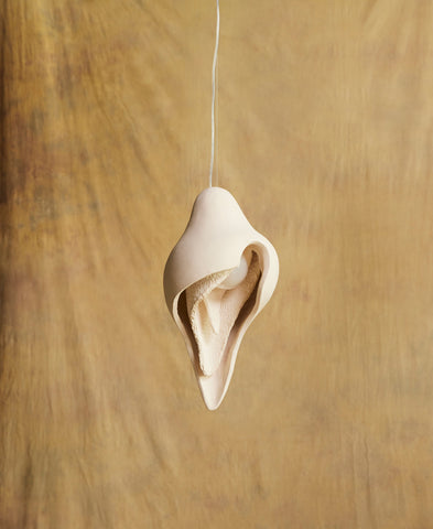 Womb Pendants
