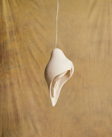 Womb Pendants