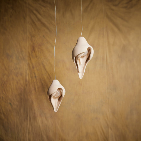 Womb Pendants