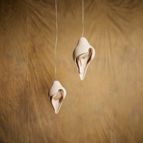 Womb Pendants